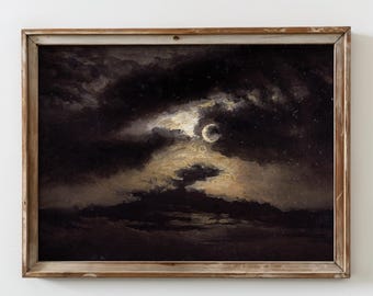 May include: A framed vintage painting depicts a night sky with a crescent moon peeking through dark, dramatic clouds. The artwork features a palette of blacks, grays, and creams, with a rustic wooden frame.