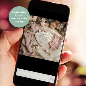 May include: A smartphone displays a baby announcement scene. The scene includes a heart-shaped sign with the text "OH BABY, IT'S A little lady!", baby clothes, shoes, and a blanket. The image is surrounded by flowers. The phone also displays the text "Includes step-by-step instructions for editing."
