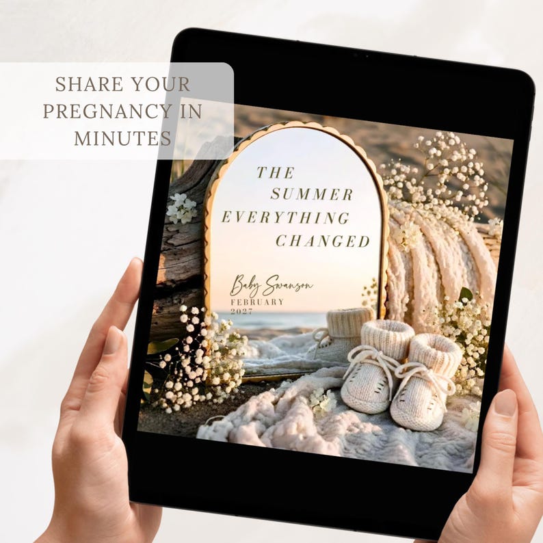 May include: A digital tablet displaying a pregnancy announcement graphic featuring an arched mirror on a beach, baby booties, and white flowers. The text reads: SHARE YOUR PREGNANCY IN MINUTES, THE SUMMER EVERYTHING CHANGED, Baby Swanson, FEBRUARY 2027.