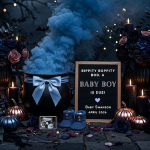 May include: A Halloween-themed baby announcement featuring a black cauldron with blue smoke, a sign that reads "Baby Boy is Due!" and baby booties. The scene includes pumpkins, candles, and floral arrangements, creating a festive atmosphere.