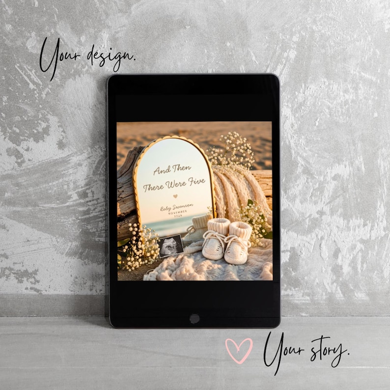 May include: A digital tablet displaying an arched mirror with the text 'And Then There Were Five', 'Baby Swanson', and 'November 2025'. The mirror reflects a beach scene with baby booties, a sonogram, and baby's breath flowers on a blanket.