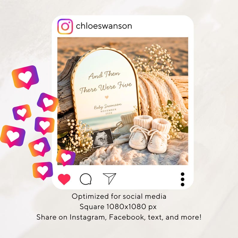 May include: An arched mirror with a gold frame displays the text And Then There Were Five, Baby Swanson, and November 2026. A pair of cream-colored knit baby booties and a sonogram image are placed in front of the mirror alongside white flowers.