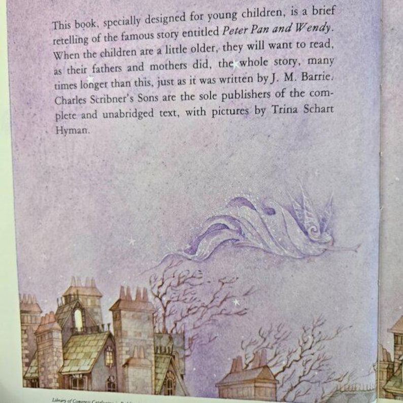 May include: An open book page with text about the story of Peter Pan and Wendy. The illustration features a whimsical scene with buildings and a flying figure in shades of purple and white. The text is in black.