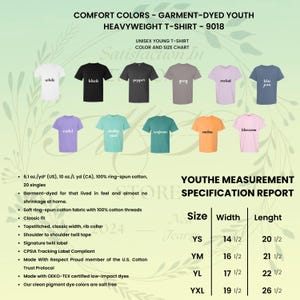 May include: A color chart for unisex youth heavyweight t-shirts. The chart displays various t-shirt colors, including white, black, grey, and blue jean. The image also includes a size chart with measurements in inches, and product details.