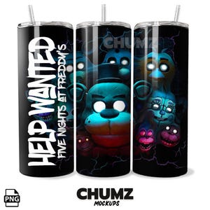 May include: Black tumbler featuring characters from Five Nights at Freddy's. The tumbler has a straw and the words "Help Wanted" and "Five Nights at Freddy's" in white. The design includes various character faces in shades of blue, red, and yellow.