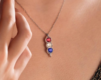 Collar con piedra de nacimiento familiar: un regalo de recuerdo con un toque de color.