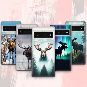 May include: Five different phone cases featuring a moose design. The cases are all black and each showcases a unique moose illustration. Designs include a moose in a forest, a moose against a starry sky, a moose with a blue and green aurora borealis backdrop, a moose with a white and blue winter scene, and a moose in a brown and green forest setting.