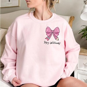 Custom Teacher Coquette Bow Sweatshirt, Custom Teacher Name Shirt, Teacher Appreciation Gift, Cute Teacher Christmas Shirt, Back To School