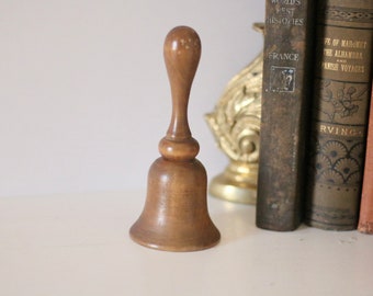 vintage / wooden brass bell with metal inside