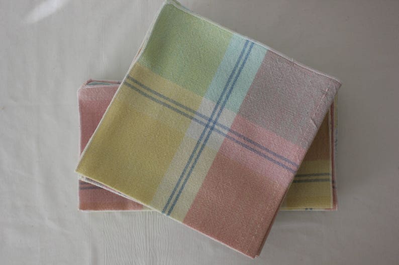 Cloth Table Napkins In Pastels White And Stripes Of Blue Image 0