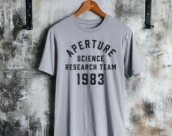 Aperture Science Team 1983 Unisex T-Shirt