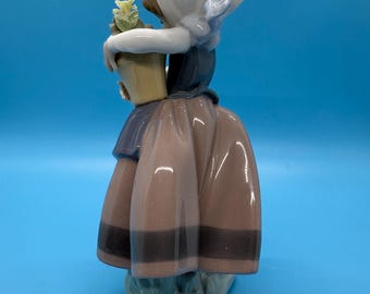 Lladro Spring is Here Figurine, Girl With Flowers, Jose Puche
