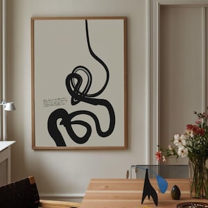 May include: A framed black and white abstract art print with a quote in cursive script. The quote reads "Trust in the Lord with all your heart and lean not on your own understanding; in all your ways submit to him, and he will make your paths straight."