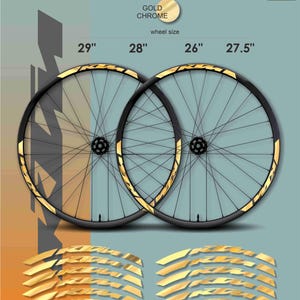 May include: Gold chrome bicycle wheels with black spokes and rims. The image shows wheel sizes of 29", 28", 26", and 27.5". Gold decals are also included. The Max Model Studio logo is in the upper right corner.