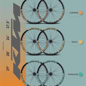 May include: Image of bicycle wheels in copper, gold, and turquoise. Wheel sizes are 26", 27.5", 28", and 29". The wheels have black spokes and rims with colored accents. The "MAX MODEL STUDIO" logo is in the top right corner.