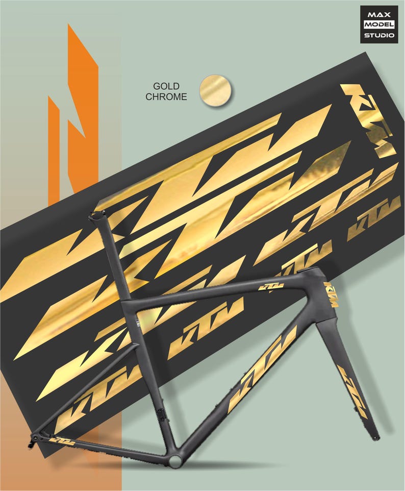 May include: A black bicycle frame with gold chrome accents and the KTM logo. The frame is positioned in front of a black background with gold KTM logos. The words "Gold Chrome" are visible.