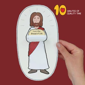 Op de afbeelding: Een printbare knutselactiviteit met een cartoonillustratie van Jezus die een stuk brood vasthoudt met de tekst "Ik ben het brood des levens".