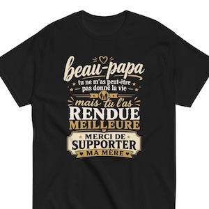 May include: Black t-shirt with a French message in white and gold lettering. The text reads "beau-papa" above a message that translates to "you may not have given me life, but you made it better." The shirt also says "Thank you for supporting my mother."