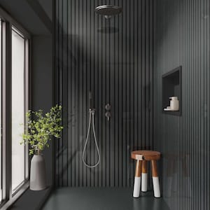 May include: A modern bathroom with dark gray vertical paneling, a rain shower head, and a small wooden stool with white-tipped legs. A vase with greenery sits near a large window. The floor is a dark herringbone pattern.