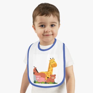 コントラストのあるトリムがかわいい動物柄のベビービブ。授乳タイムに最適。ベビーシャワーギフト。新生児の必需品。幼児用アクセサリー。
