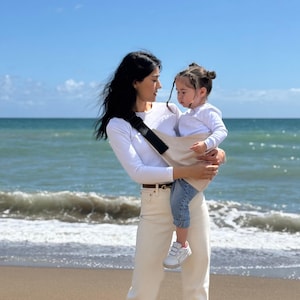 Portabebés de cadera para bebés pequeños - 100 % algodón orgánico, soporta hasta 20 kg, correa de porteo compacta, fácil de usar y probada para mayor seguridad, regalo para mamá