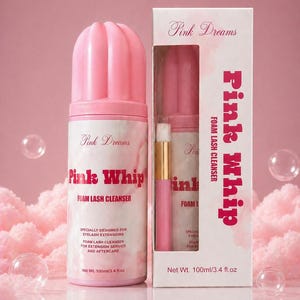 May include: A pink foam lash cleanser product with the text "Pink Whip" and "Pink Dreams". The product is designed for eyelash extensions and comes in a pink bottle and box. The net weight is 3.4 fl oz.