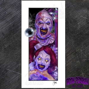 May include: A digital art print featuring two sinister clowns. The top clown has a pale face with a wide, toothy grin and a blood-stained headpiece. The bottom clown has red hair, a small hat, and glowing yellow eyes. The artwork is signed by the artist.