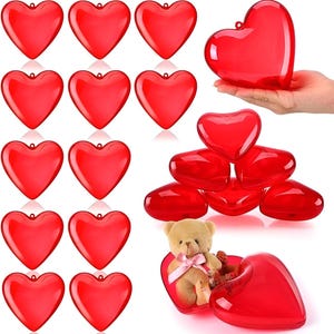 May include: A set of 15 red heart-shaped plastic containers. The containers are clear and have a shiny finish. They are ideal for holding small gifts or treats.