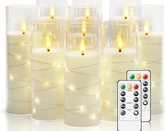 Pode incluir: Um conjunto de velas de pilar LED de cor marfim em cilindros de vidro transparente. Cada vela tem um efeito de chama tremeluzente e é envolta com luzes de fio. Dois controles remotos estão incluídos.