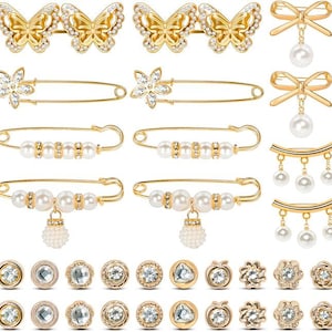 Peut inclure: Un ensemble de 10 épingles de sûreté dorées avec des accents de perles. Les épingles sont disponibles dans une variété de styles, notamment des papillons, des nœuds et des designs simples. Les épingles sont parfaites pour ajouter une touche d'élégance à n'importe quelle tenue.