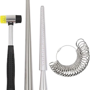 May include: A jewelry making kit featuring a yellow and black mallet, a silver ring mandrel, a ring sizer, and a set of silver ring sizer gauges. The tools are designed for measuring and shaping rings.