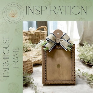 May include: A farmhouse-style wooden frame with a scalloped edge and a decorative bow. The bow is made of tan and black checkered fabric and is adorned with a button. The frame has the word "INSPIRATION" and "FARMHOUSE FRAME" in the image.