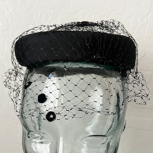 Vintage black pillbox with mesh veil