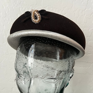 Vintage pillbox hat with veil and pearl details