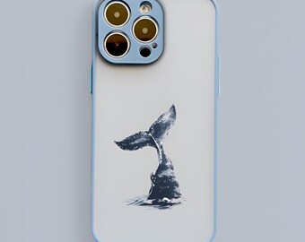 May include: A light blue phone case with a whale tail design. The case has a camera lens cover with four holes.