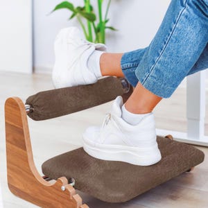 ergonomic footrest
soft microfibre
footrest suede finish
ankle cushion wooden
footrest adjustable
footrest under desk
footrest rocking
footrest office
foot support for posture