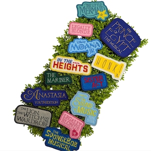 May include: A collection of embroidered fabric patches featuring titles of musical productions including The Little Mermaid, Legally Blonde, The Prince of Egypt, Moana Jr, In The Heights, Honk!, The Mariner, Sister Act, Anastasia, The Sound of Music, The Lion, the Witch and the Wardrobe, and The SpongeBob Musical.
