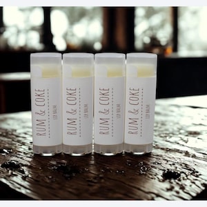 May include: A trio of ceramic mugs with a speckled, matte finish in cream, light grey, and dark grey. Each mug features a simple, minimalist design, ideal for tea or coffee.