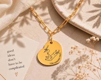 Collar con colgante de corazón y clip de papel grabado con la frase "Fruta que no tienes a mano", regalo de marketing.