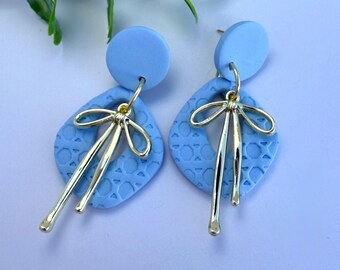 Vera - Sky Blue Polymer Clay with a Gold Bow Feminine Statement Earrings
