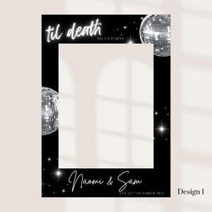 May include: Black photo booth prop with white text that reads "til death DO US PARTY". The frame has two disco balls and the names "Naomi & Sam" with the date "SAT 25TH OCTOBER 2023". Design 1 is in the bottom right corner.