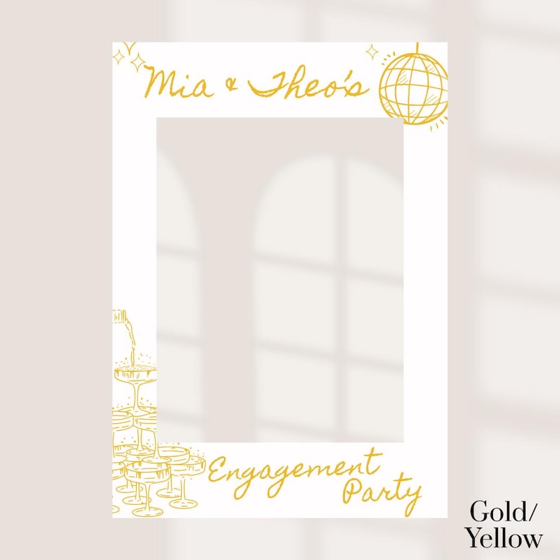 May include: White photo booth prop with gold text and illustrations. The text reads "Mia & Theo's" and "Engagement Party." A disco ball and champagne glasses are also featured. The prop is designed for engagement parties.
