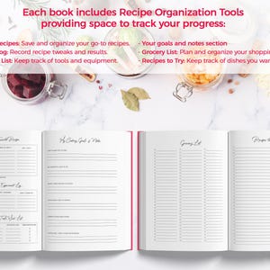 May include: Open recipe book with pink edges, featuring sections for favorite recipes, experiment logs, and grocery lists. The text reads "Each book includes Recipe Organization Tools providing space to track your progress:" with additional sections for notes and recipes.