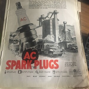 AC Spark Plug ad buy war bonds. WWII.