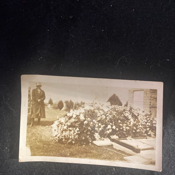 Paying respect to the dead. Funeral burial graveside photo 4 x 3