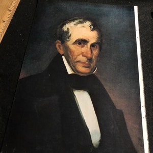 May include: A portrait painting of a man with white hair and a dark suit. He is wearing a white shirt and a dark tie. The background is a dark blue.