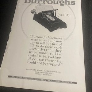 May include: Black and white vintage advertisement for Burroughs Adding Machine Company. The ad features a black Burroughs adding machine with the text "Burroughs Quality" above it. The text reads "Burroughs Machines were never built simply to sell but, first of all, to do their work perfectly; then they were made to last indefinitely-then of course their sale could not be stopped." The ad also includes the company's address: 6250 Second Boulevard, Detroit, Michigan.