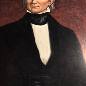May include: A portrait painting of a man with white hair and a black suit. He is wearing a white shirt and a black tie. The background is a dark red.