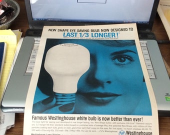 Circa 1962 Westinghouse white bulb ad. 13 1/2 x 10 1/2.