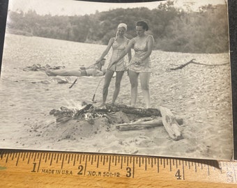 Roasting your wiener on the beach original photo